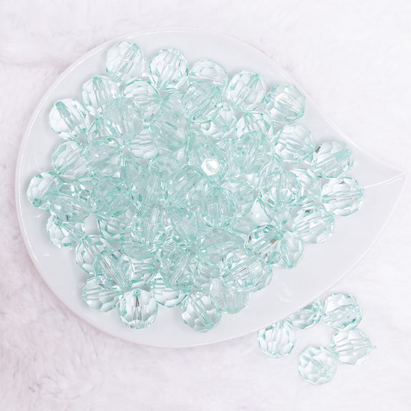 top view of a pile of 16mm Mint Green Transparent Faceted Bubblegum Beads