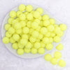 top view of a pile of 16mm Neon Yellow Rhinestone Bubblegum Beads