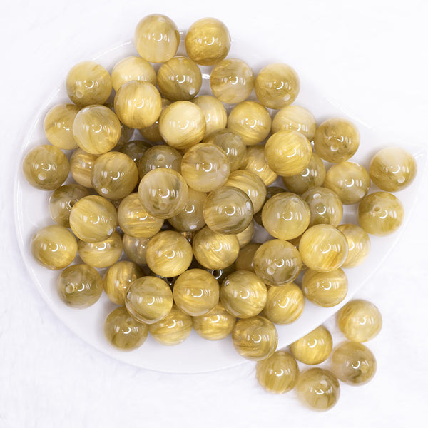 top view of a pile of 16mm Olive Green Luster Bubblegum Beads