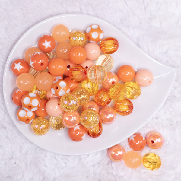 top view of a pile of 16mm Orange Acrylic Bubblegum Bead Mix