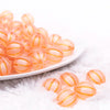 front view of a pile of 16mm Orange Frosted Pumpkin Shaped Bubblegum Bead