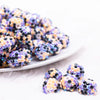 front view of a pile of 16mm Orange, Purple and Black Confetti Rhinestone Bubblegum Beads