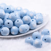 front view of a pile of 16mm Pastel Blue with White Hearts Bubblegum Beads