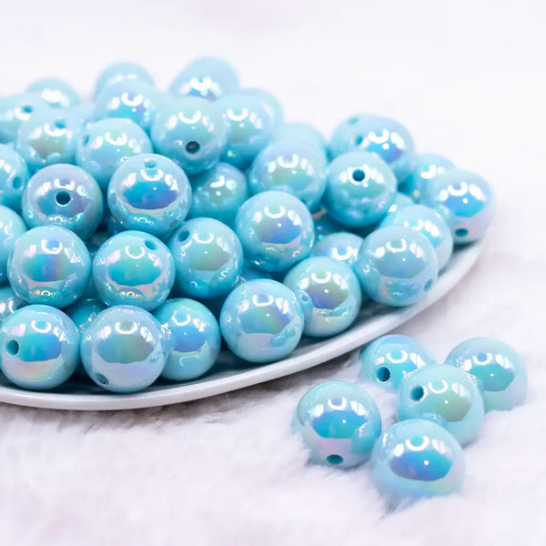 front view of a pile of 16mm Pastel Blue Solid AB Bubblegum Beads