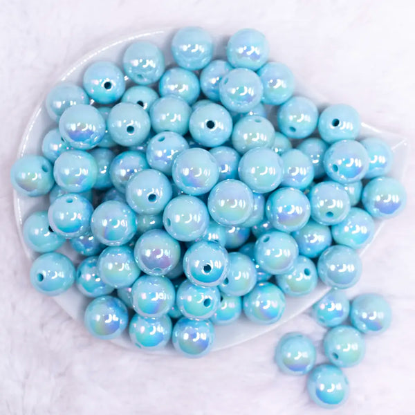 top view of a pile of 16mm Pastel Blue Solid AB Bubblegum Beads