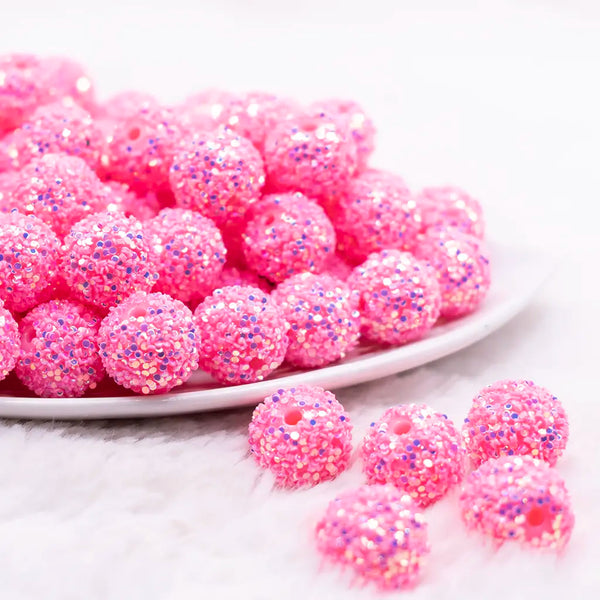 front view of a pile of 16mm Pink Sequin Confetti Bubblegum Beads