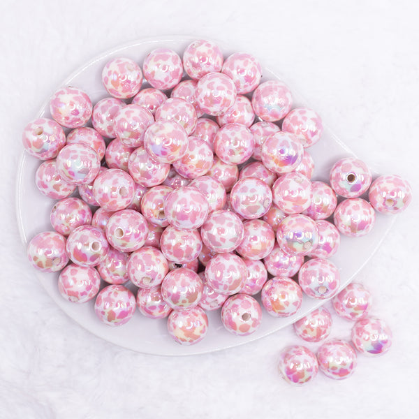 top view of a pile of 16mm Pink Cow Print with AB finish Bubblegum Beads