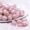 front view of a pile of 16mm Pink and Gold Flake Acrylic Chunky Bubblegum Beads