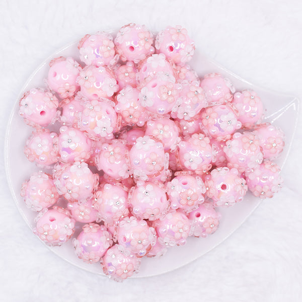 top view of a pile of 16mm Pink Floral Bliss luxury acrylic beads