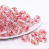 front view of a pile of 16mm Pink Flaked Flower Bubblegum Bead