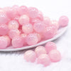 front view of a pile of 16mm Pink Luster Bubblegum Beads