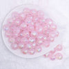top view of a pile of 16mm Pink Opalescence Bubblegum Bead