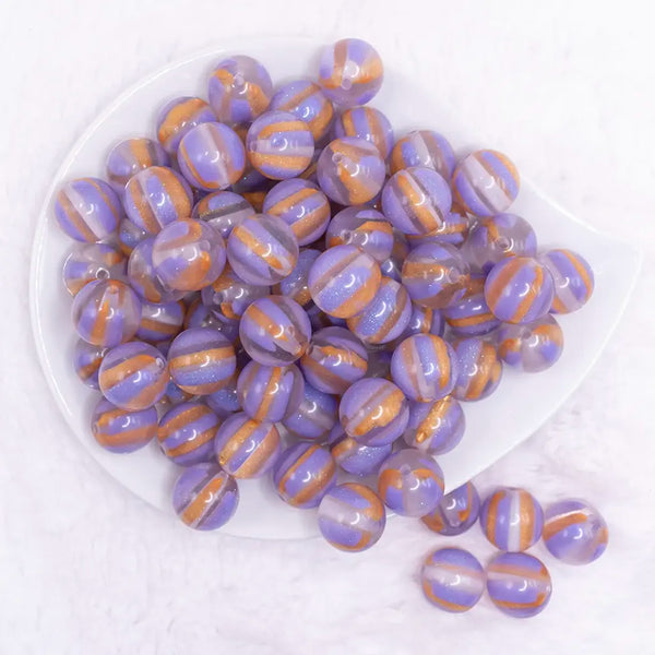 top view of a pile of 16mm Purple Cats Eye Acrylic Bubblegum Beads