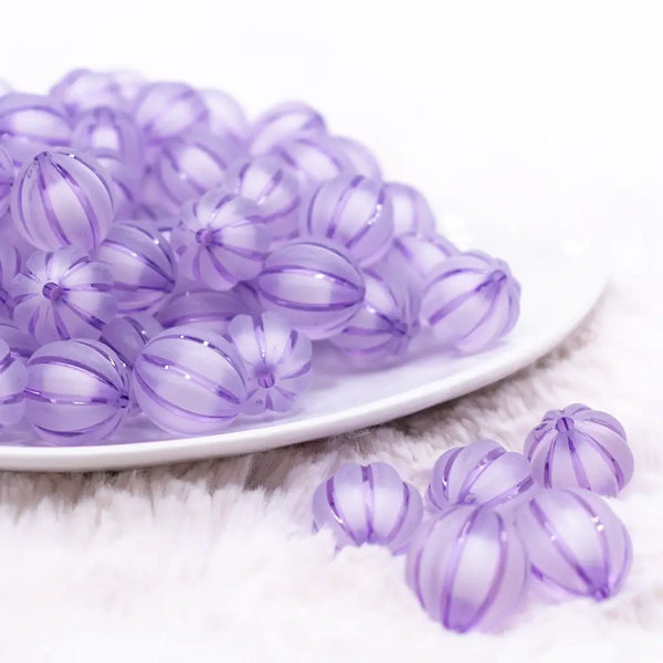front view of a pile of 16mm Purple Frosted Pumpkin Shaped Bubblegum Bead