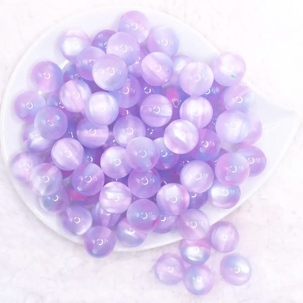 top view of a pile of 16mm Purple Illusion Glitter Bubblegum Bead