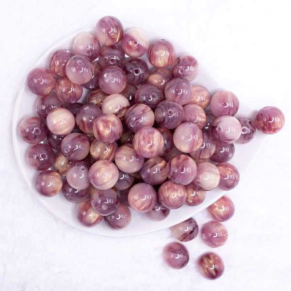 top view of a pile of 16mm Purple Luster Bubblegum Beads