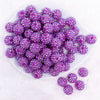 top view of a pile of 16mm Purple Neon Rhinestone AB Bubblegum Beads
