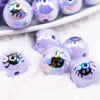 close up view of a pile of 16mm Purple AB with Spider Print Bubblegum Beads