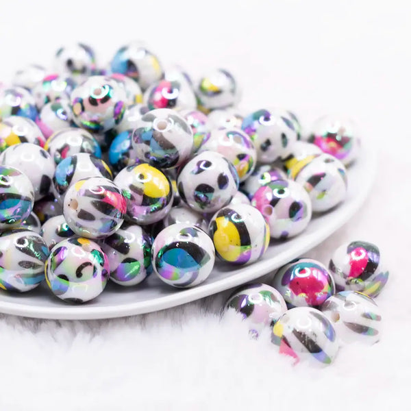 front view of a pile of 16mm Rainbow Leopard Print with AB finish Bubblegum Beads