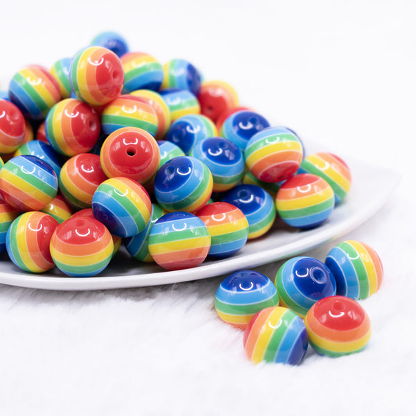 front view of a pile of 16mm Rainbow Stripe Bubblegum Beads