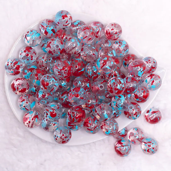 top view of a pile of 16mm Blue and Red Splatter Bubblegum Bead