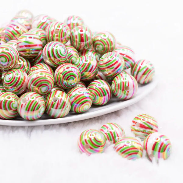 front view of a pile of 16mm Red and Green Swirl Bubblegum Beads