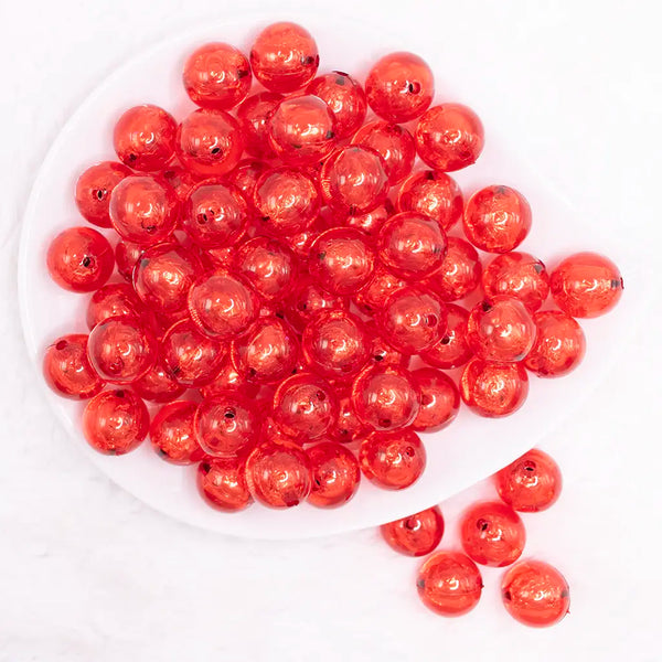 top view of a pile of 16mm Red Foil Bubblegum Beads