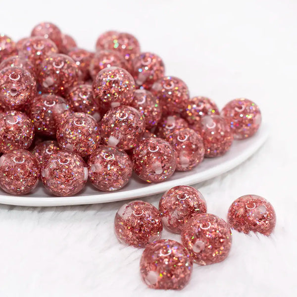 front view of a pile of 16mm Red Glitter Twinkle Bubblegum Beads