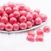 front view of a pile of 16mm Red Swirl Bubblegum Beads