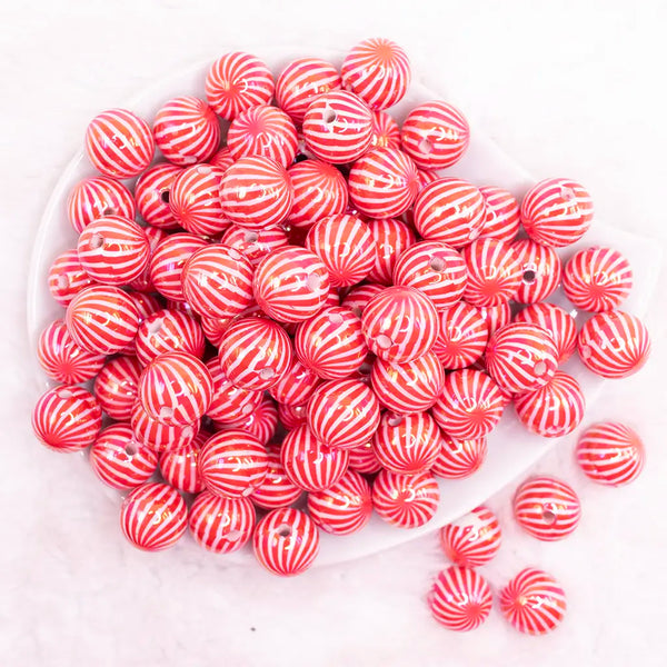 top view of a pile of 16mm Red Swirl Bubblegum Beads