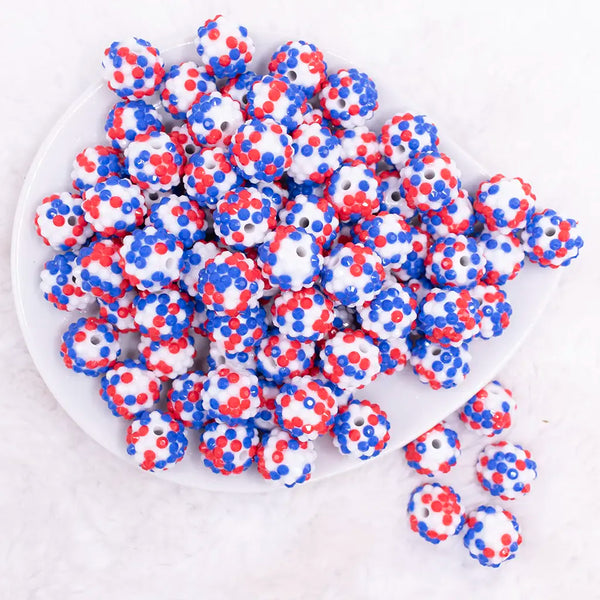 top view of a pile of 16mm Red, White and Blue Confetti Rhinestone Bubblegum Beads