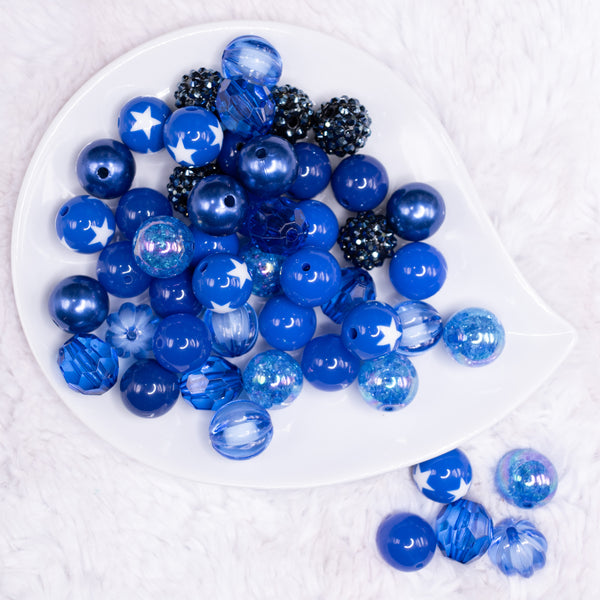 top view of a pile of1 6mm Royal Blue Acrylic Bubblegum Bead Mix