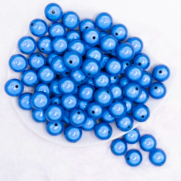 top view of a pile of 16mm Royal Blue Miracle Bubblegum Bead