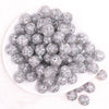 top view of a pile of 16mm Silver Glitter Twinkle Bubblegum Beads