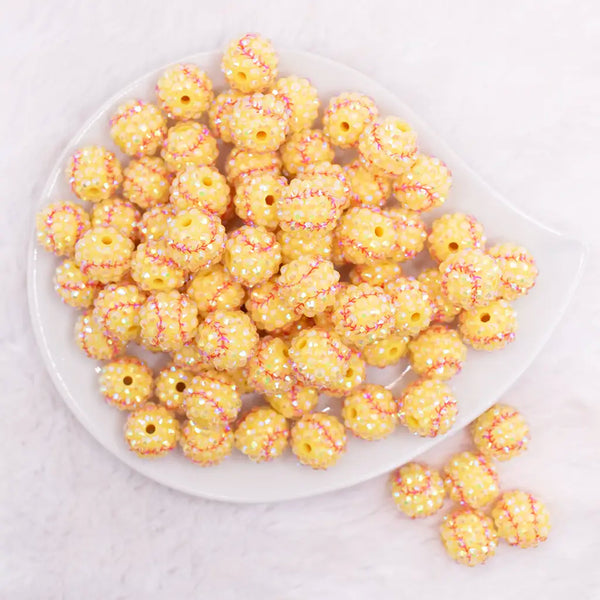 top view of a pile of 16mm Softball Rhinestone AB Bubblegum Beads