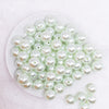 top view of a pile of 16mm Spearmint Green Faux Pearl Acrylic Bubblegum Beads