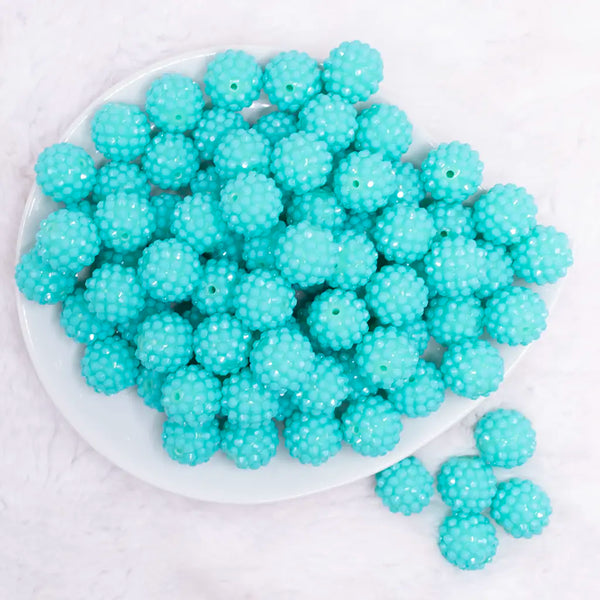 top view of a pile of 16mm Teal on Teal Rhinestone Bubblegum Beads