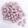 top view of a pile of 16mm Thistle Purple Rhinestone AB Bubblegum Beads