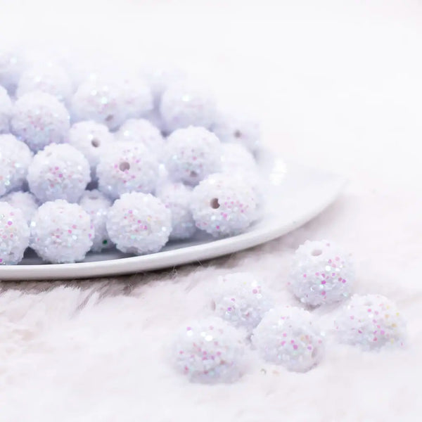 front view of a pile of 16mm White Sequin Confetti Bubblegum Beads