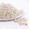 front view of a pile of 16mm White Flaked Flower Bubblegum Bead