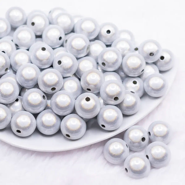 front view of a pile of 16mm White Miracle Bubblegum Bead