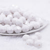 front view of a pile of 16mm White Faceted Bubblegum Beads