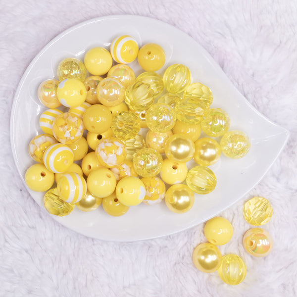 top view of a pile of 16mm Yellow Acrylic Bubblegum Bead Mix