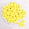 top view of a pile of 16mm Yellow on Yellow Rhinestone Bubblegum Beads