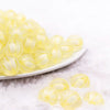 front view of a pile of 16mm Yellow Frosted Pumpkin Shaped Bubblegum Bead