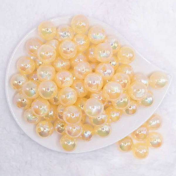 top view of a pile of 16mm Yellow Opalescence Bubblegum Bead