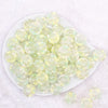 top view of a pile of 18mm Green and Yellow Confetti Acrylic Water Beads