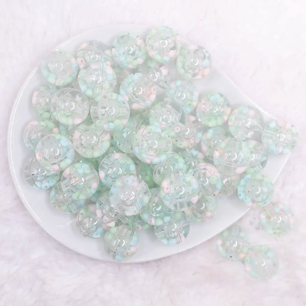 top view of a pile of 18mm Mint and Pink Confetti Acrylic Water Beads