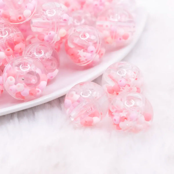 macro view of a pile of 18mm Pink Confetti Acrylic Water Beads