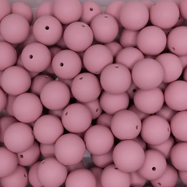 top view of a pile of 19mm Blush Pink Round Silicone Bead